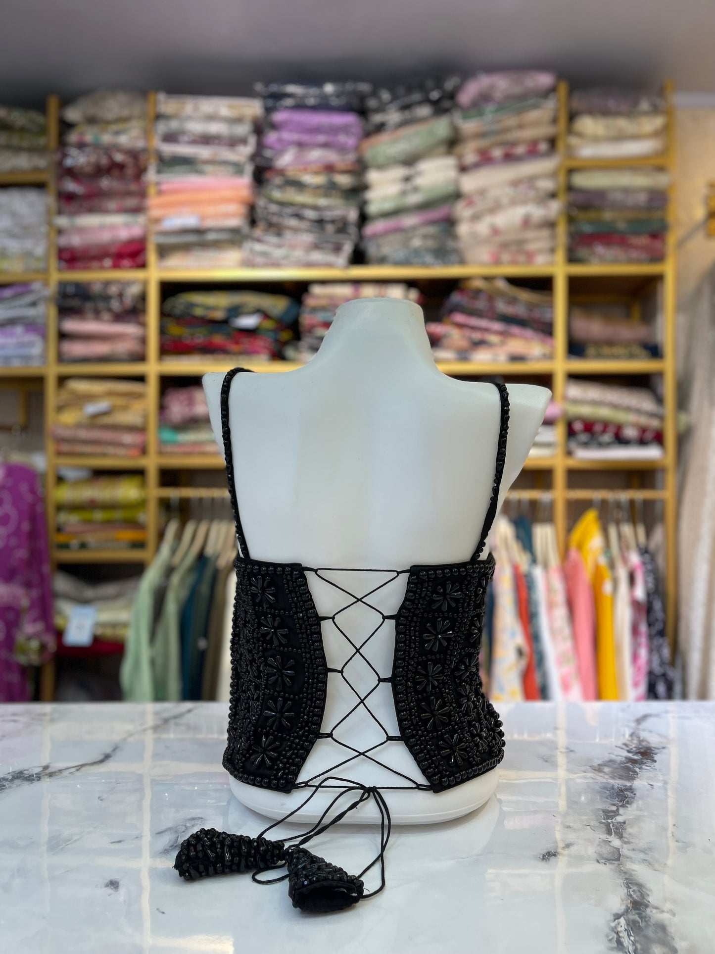 The black beaded corset blouse