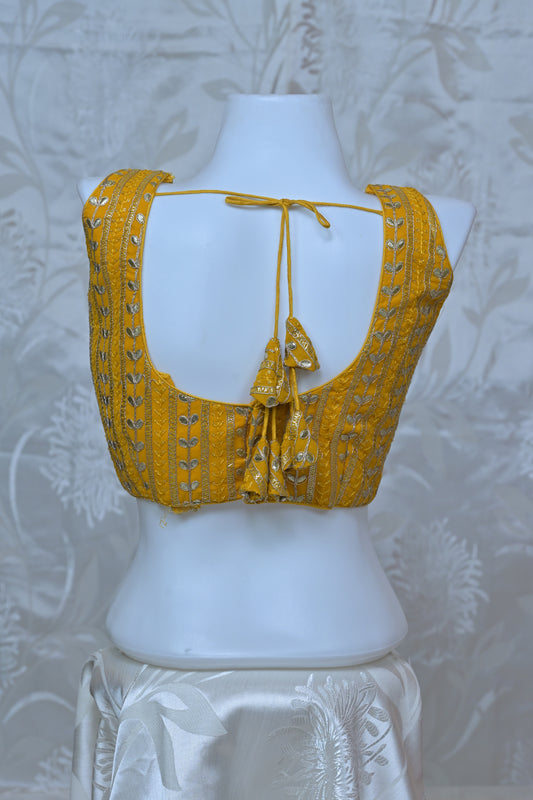 Embroidered V-Neck Sleeveless Blouse