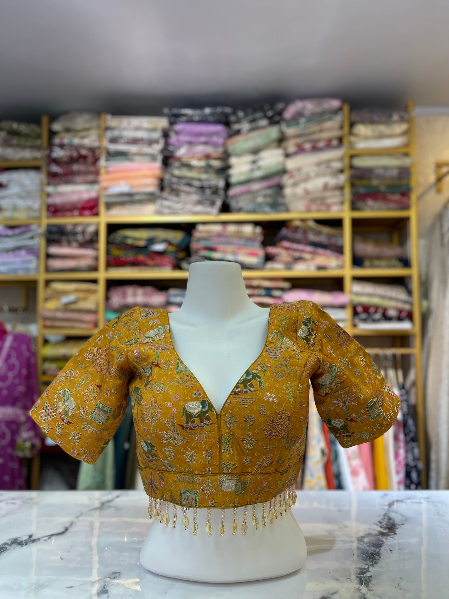 Brocade Blouse with Elephant Motif and Tassel Trim