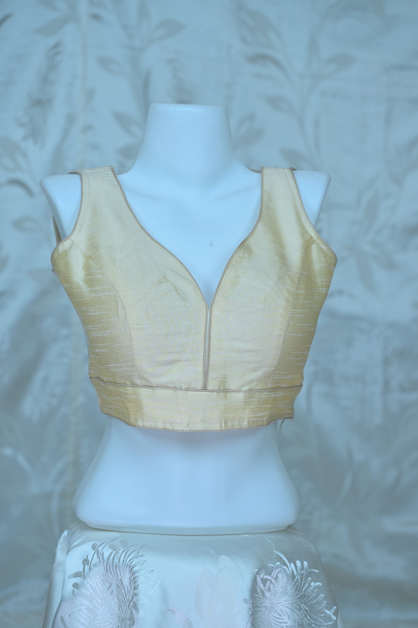 Radiant Cream Sleeveless V-Neck Blouse