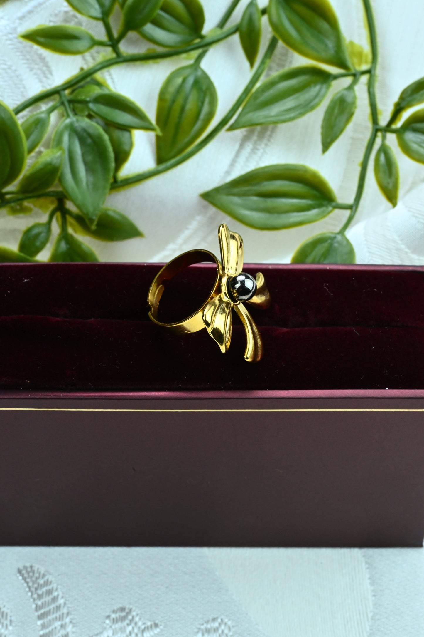 Gold-Tone Bow Ring with Black Bead
