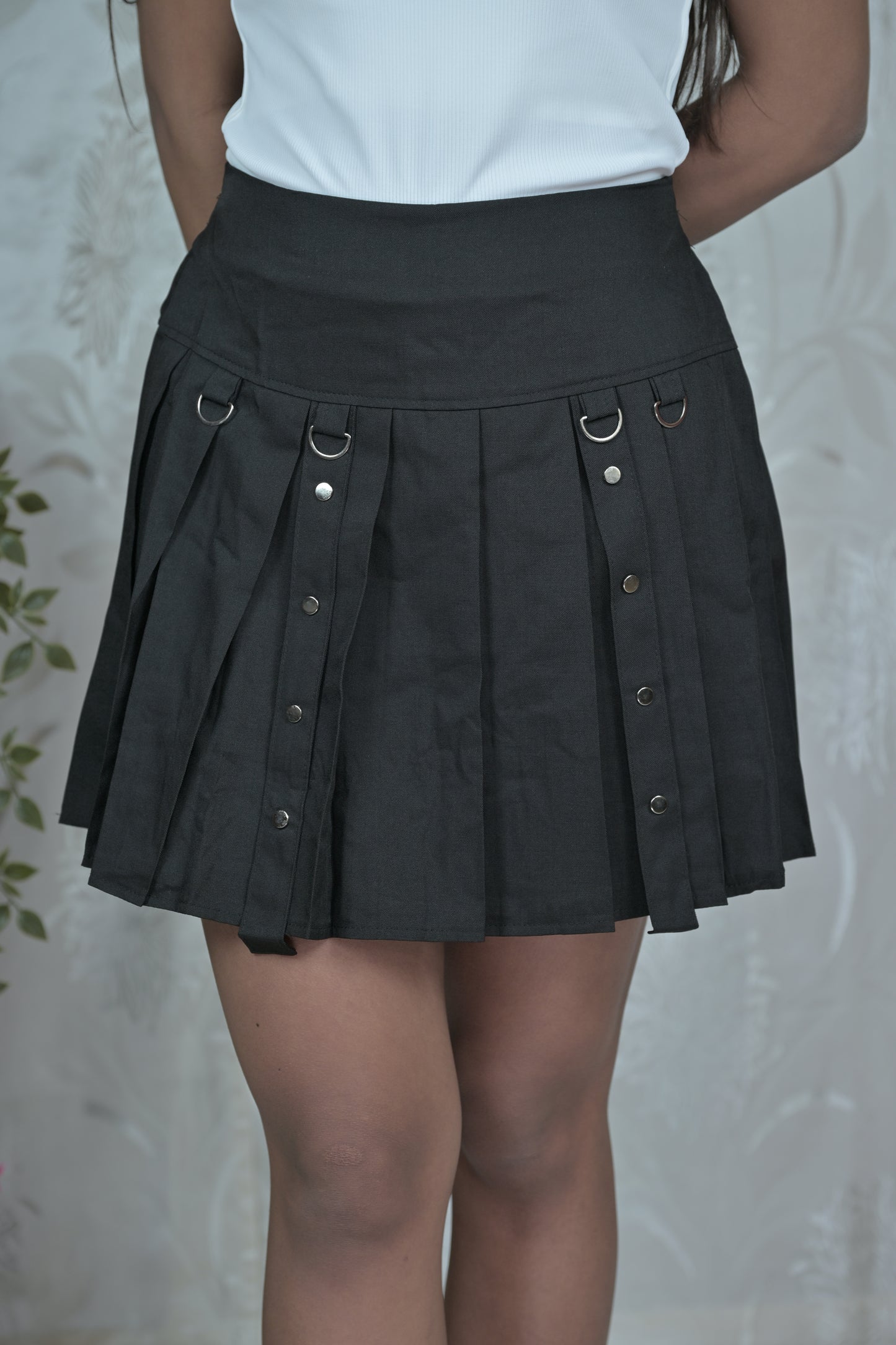 Asymmetric Pleated Skirt with Metal Details
