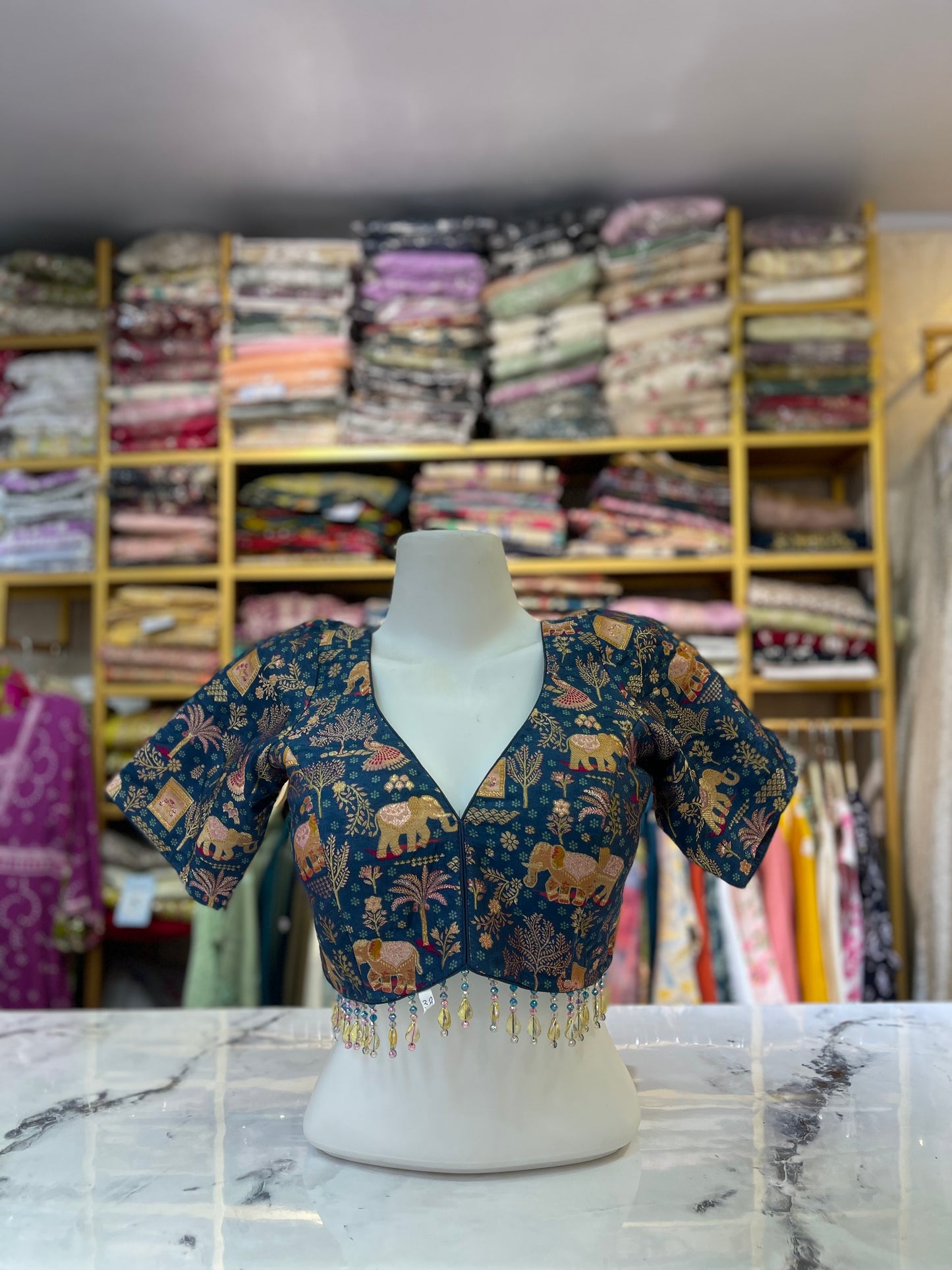 Brocade Blouse with Elephant Motif and Tassel Trim