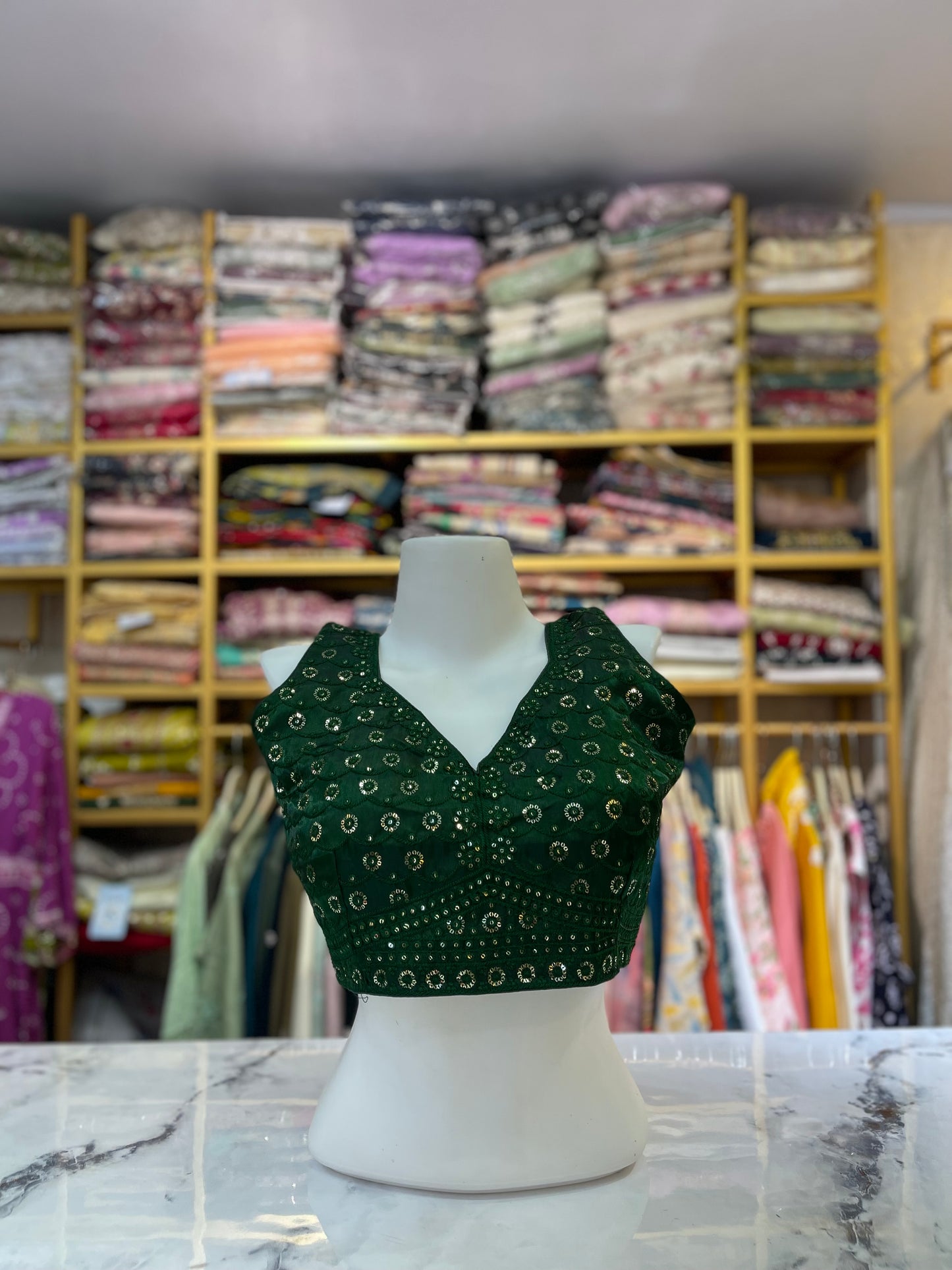 Embroidered Sleeveless V-Neck Blouse