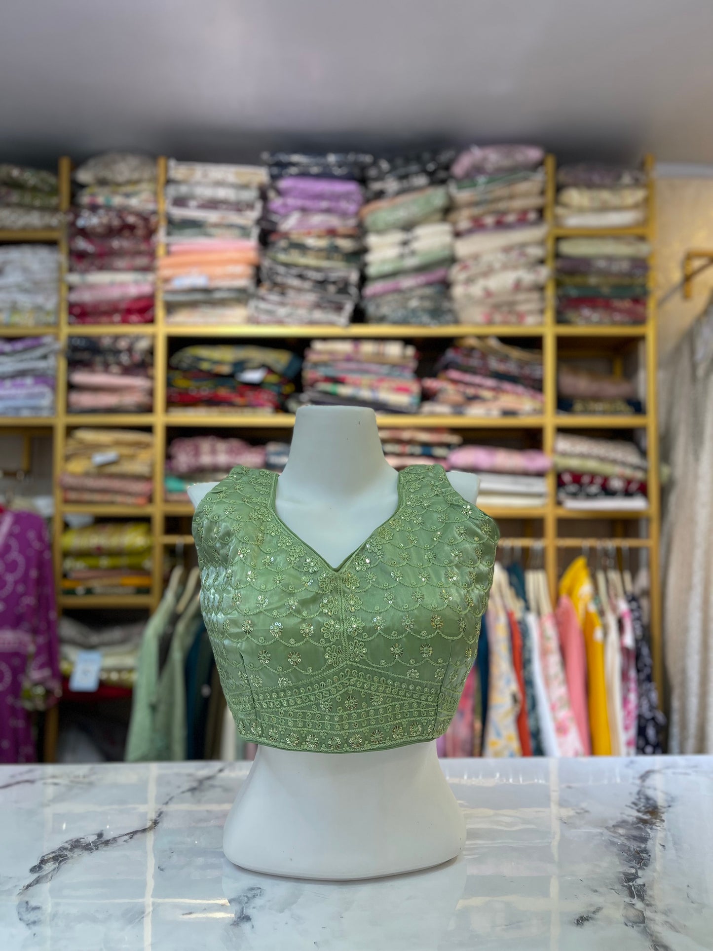 Embroidered Sleeveless V-Neck Blouse