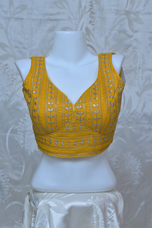 Embroidered V-Neck Sleeveless Blouse