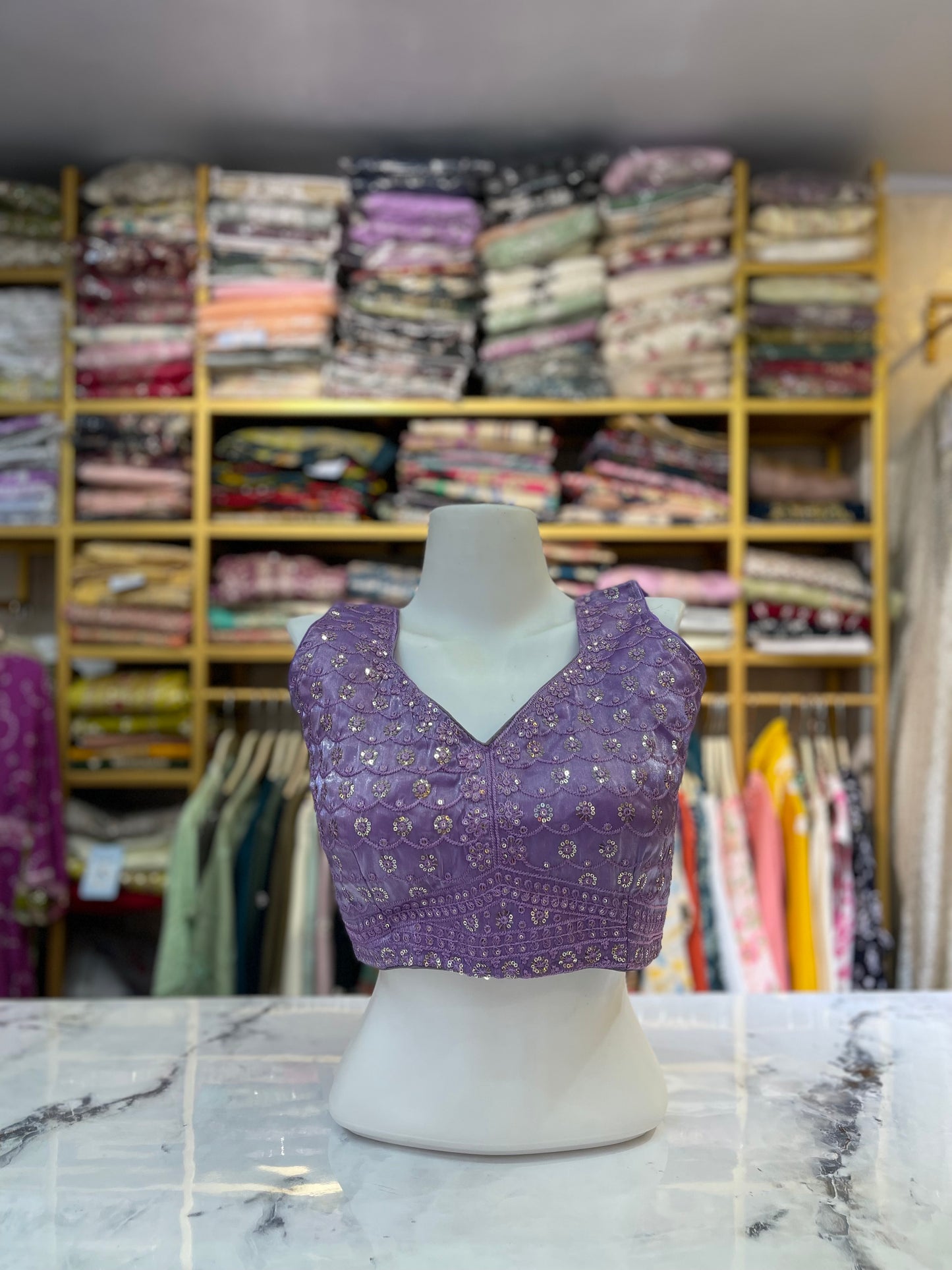 Embroidered Sleeveless V-Neck Blouse