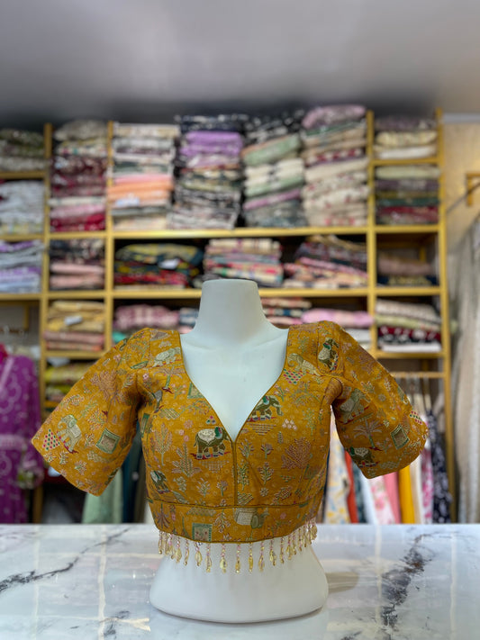 Brocade Blouse with Elephant Motif and Tassel Trim