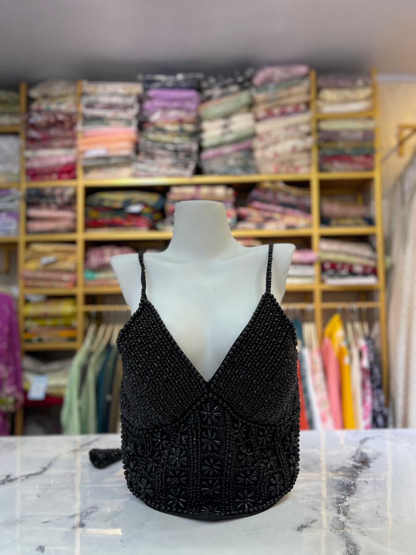 The black beaded corset blouse