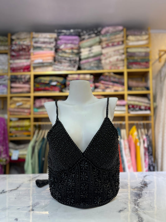 The black beaded corset blouse